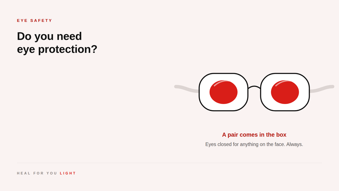 Black opaque red light goggles with an elastic cord — a pair comes in the box with every device